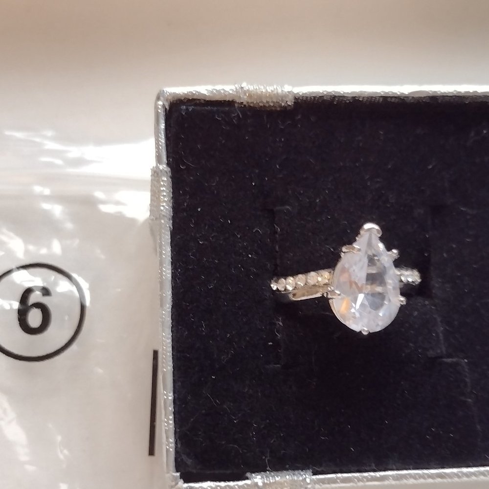 Pear shaped CZ ring New in silver tone setting.